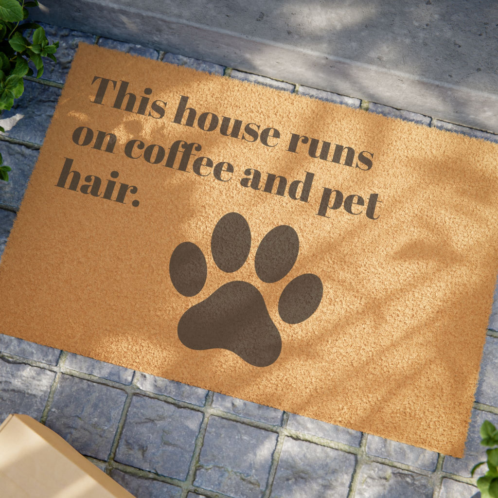 Doormat — "This House Runs on Coffee and Pet Hair" Paw Print Welcome Mat